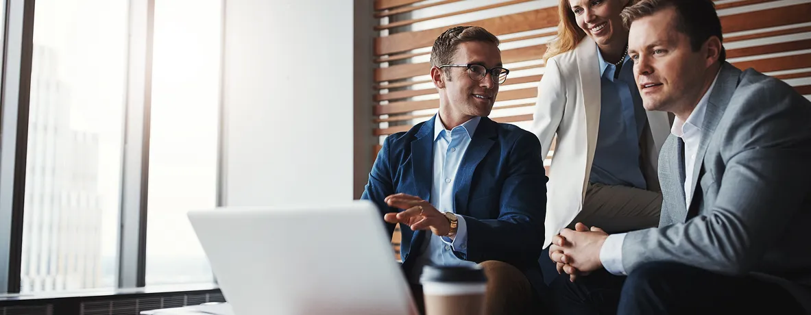 Tax professionals reviewing client work together